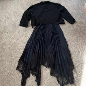 All Saints slip dress with crew neck sweater.